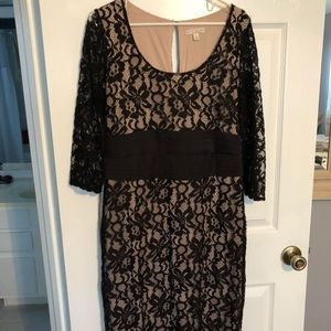 Tan and black lace dress by Eva Mendez